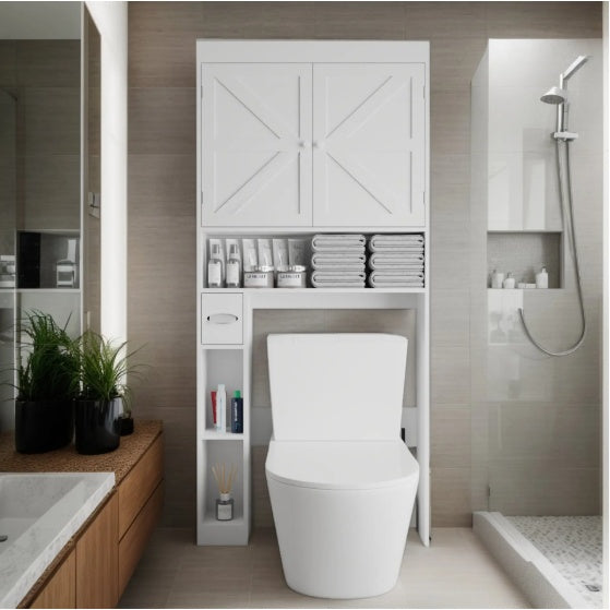 White over-the-toilet storage cabinet with two farmhouse-style doors and open bottom shelf for bathroom organization.