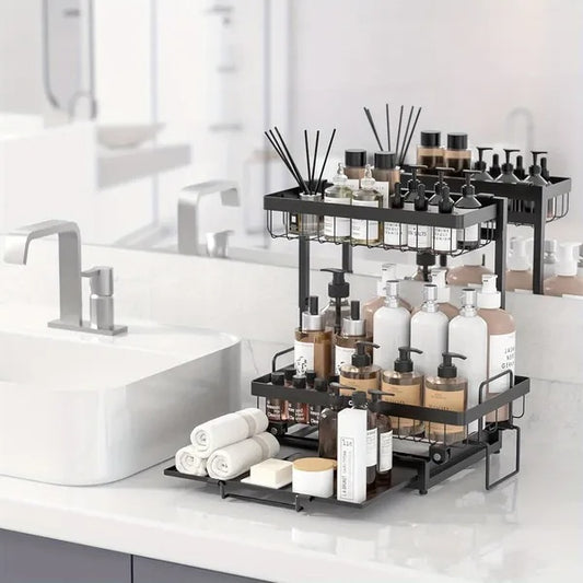 Black 2-tier slide-out under sink organizer with metal L-shaped shelves, smooth sliding bottom drawer on pulleys, ideal for kitchen and bathroom storage of cleaning supplies and spices.