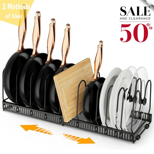 Dish rack with black pans, white plates, and a wooden cutting board on a white background with sale text.
