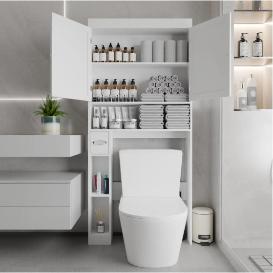 White over-the-toilet storage cabinet with two farmhouse-style doors and open bottom shelf for bathroom organization.
