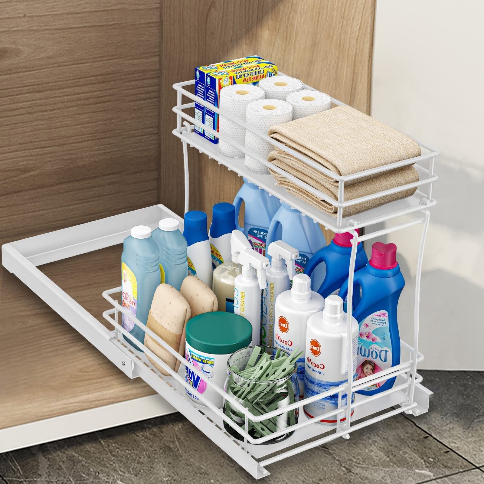 L-shaped metal pull-out cabinet organizer with two sliding drawers, made of stainless steel, designed to maximize under-sink storage by fitting around plumbing, featuring a rust-resistant finish